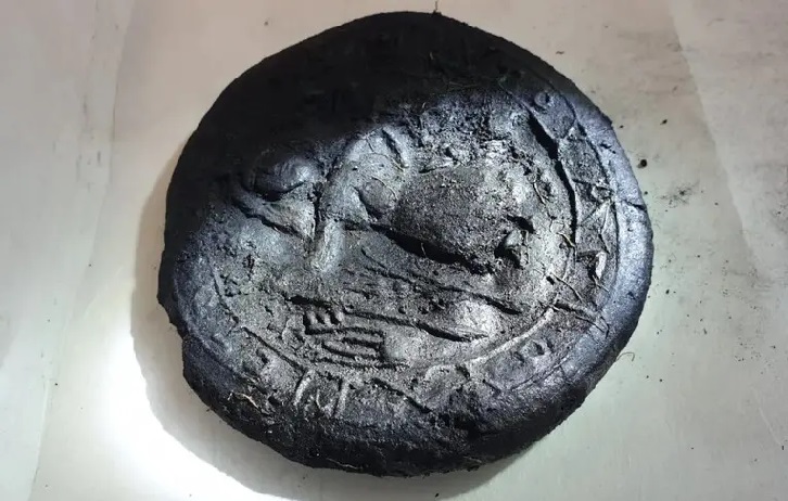 Old Bread with Image of Christ
